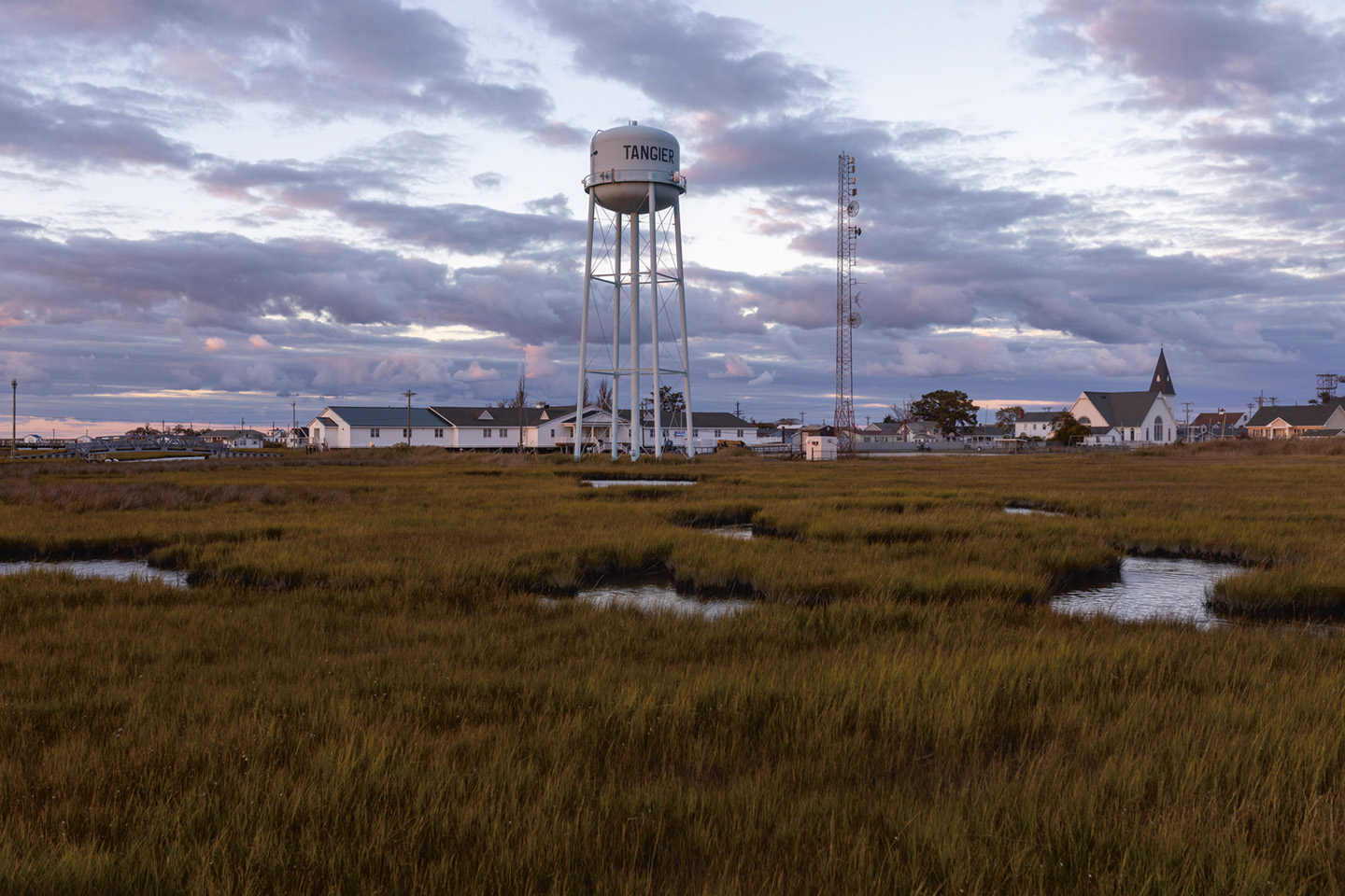 Ondergelopen land op Tangier. Wetenschappers schatten dat het eiland binnen 25 jaar helemaal zal verdwijnen.
